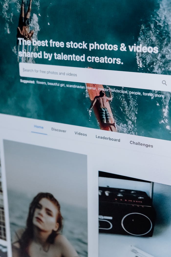 about-01 Close-up of a computer screen showing a stock photo website interface with multiple images.